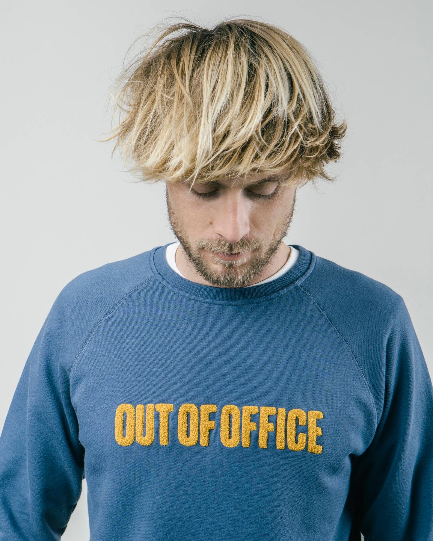 Sweat "OUT OF OFFICE"