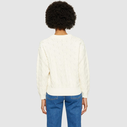 Pull torsadé en coton - blanc cassé